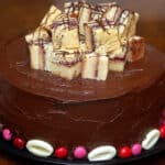 QUADRUPLE LAYER CHOCOLATE RASPBERRY CAKE & CHEESECAKE TOPPED WITH CHOCOLATE GANACHE FROSTNG & WHITE CHOCOLATE RASPBERRY BARS