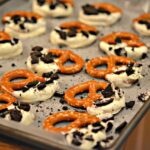 PRETZELS DIPPED IN WHITE CHOCOLATE & TOPPED WITH CRUSHED OREOS