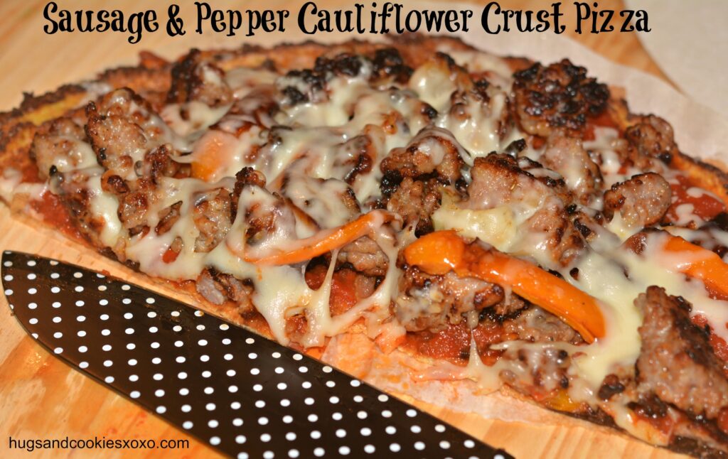 Cauliflower Pizza Crust with Sauage and Peppers 